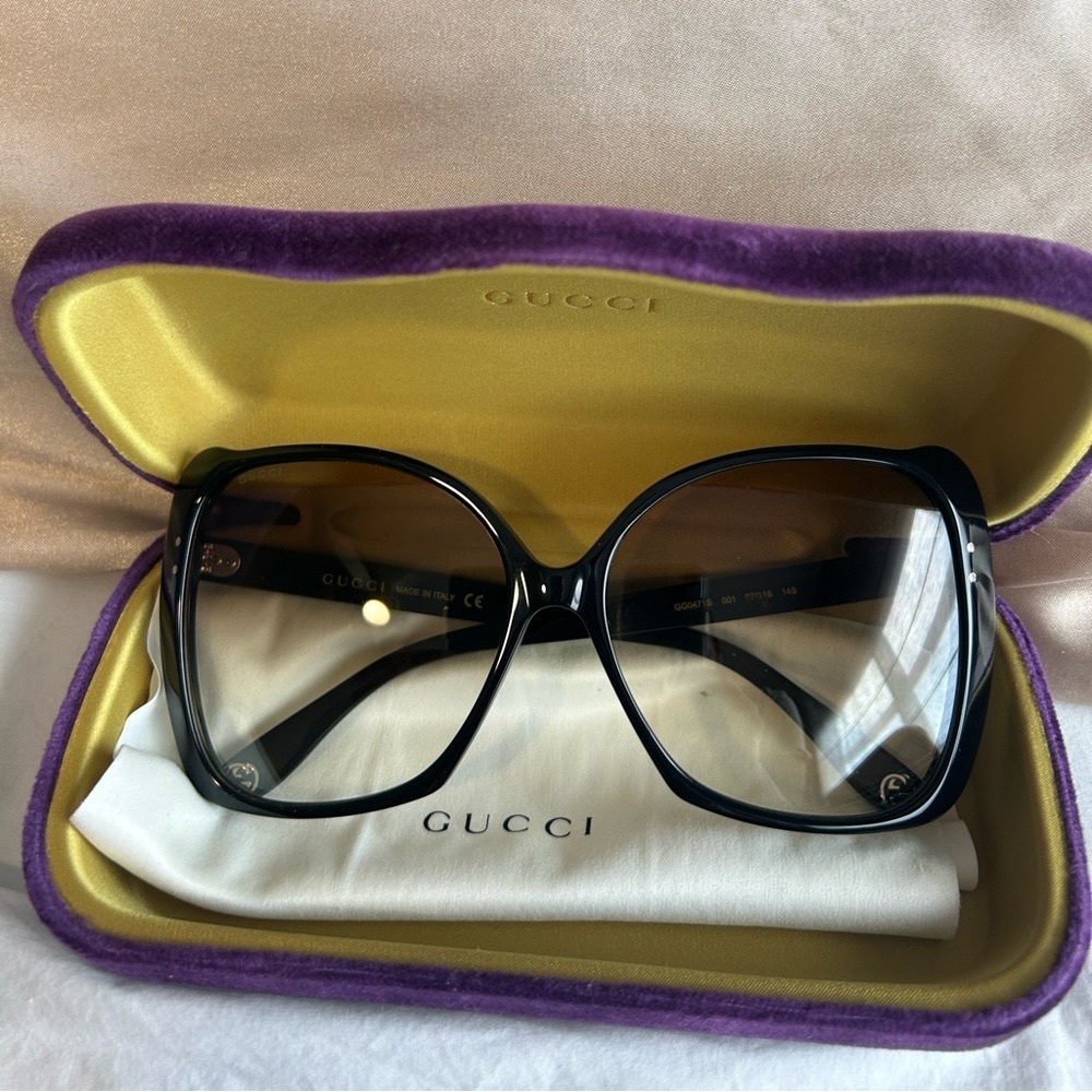 Over sized GUCCI sunglasses .